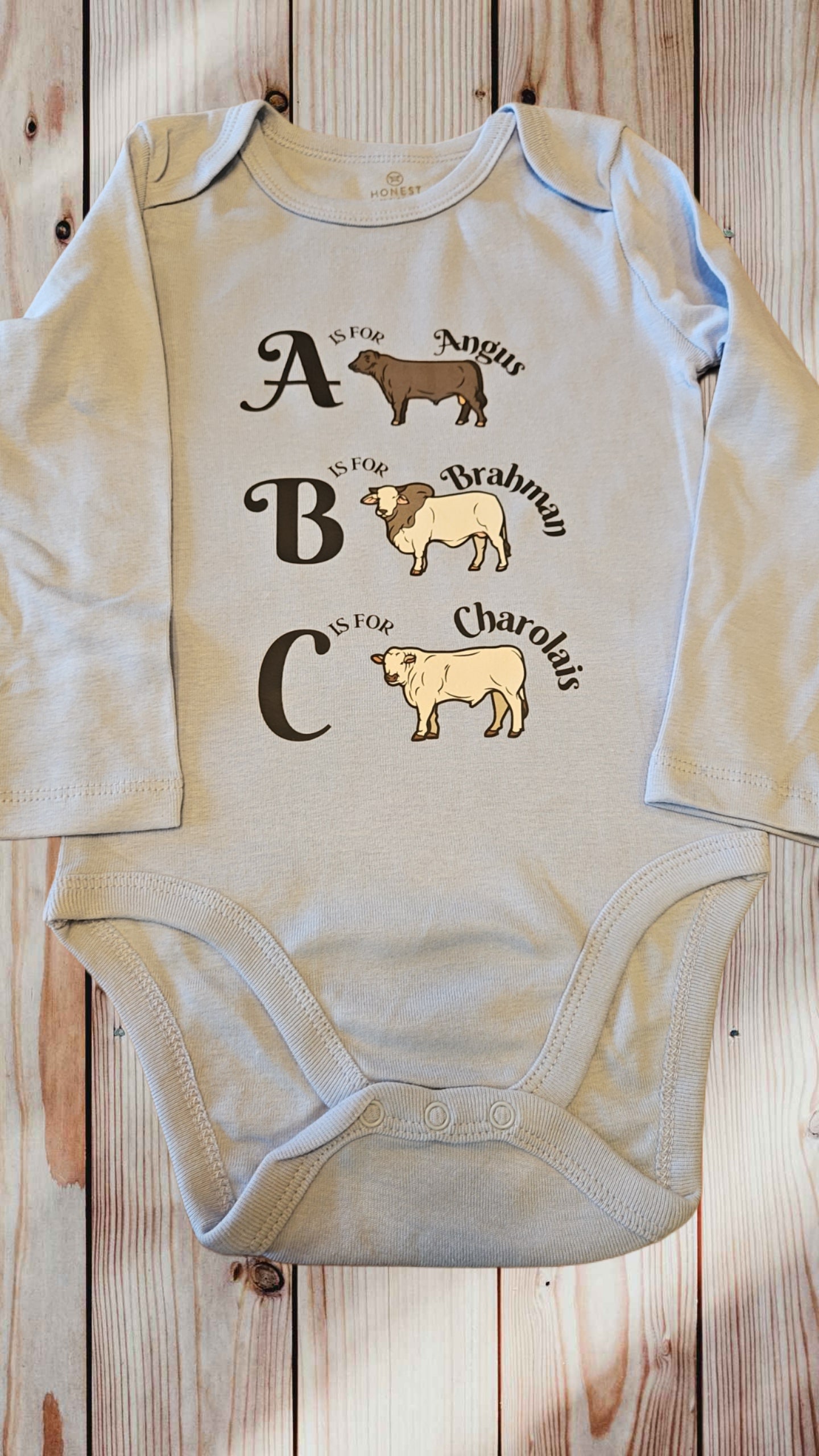 ABC cow onesie