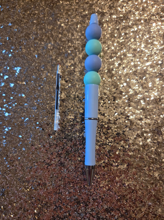 Blue and Teal Pen with one Ink Refill