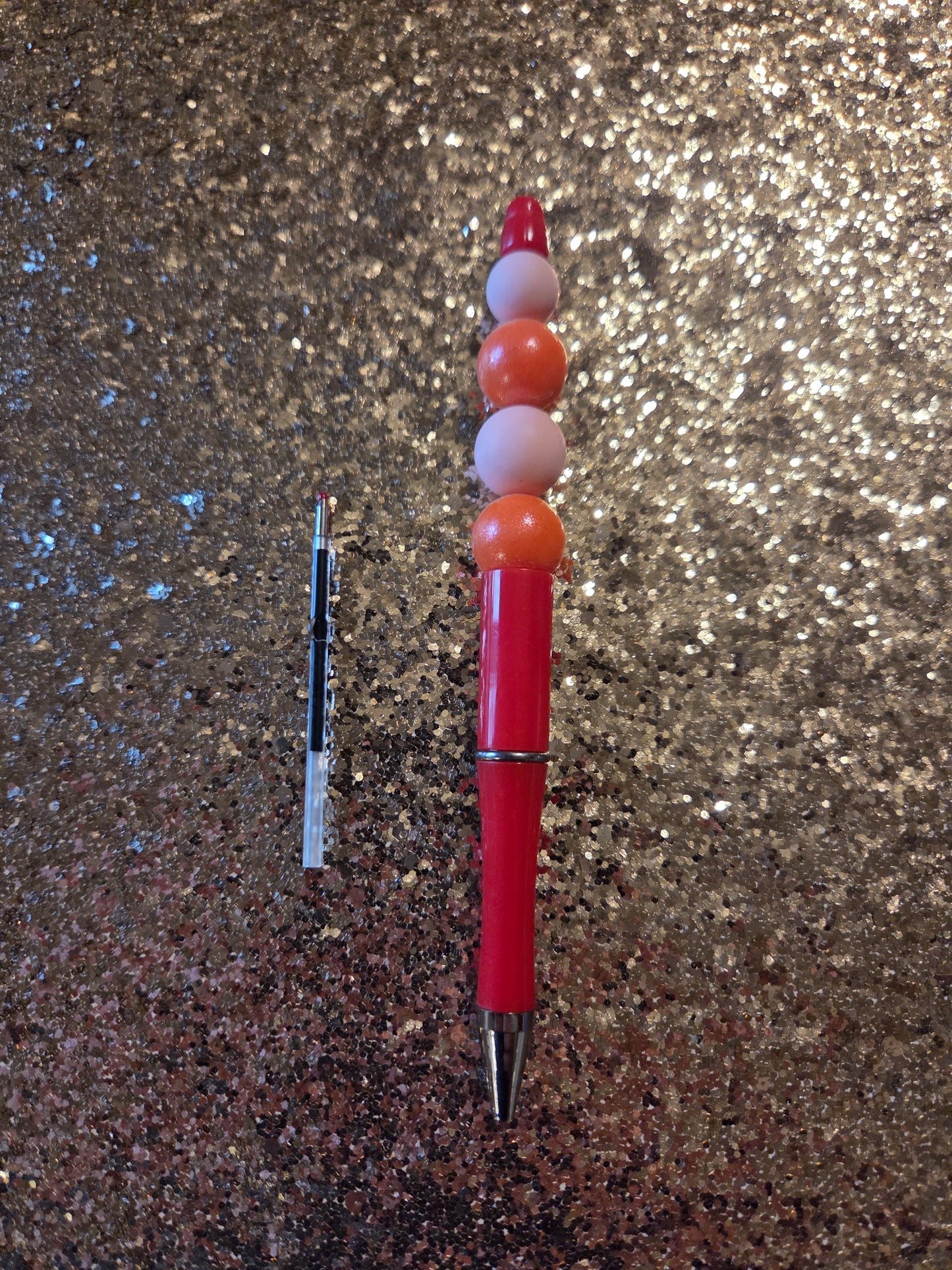 Orange and Pink Pen with one Ink Refill