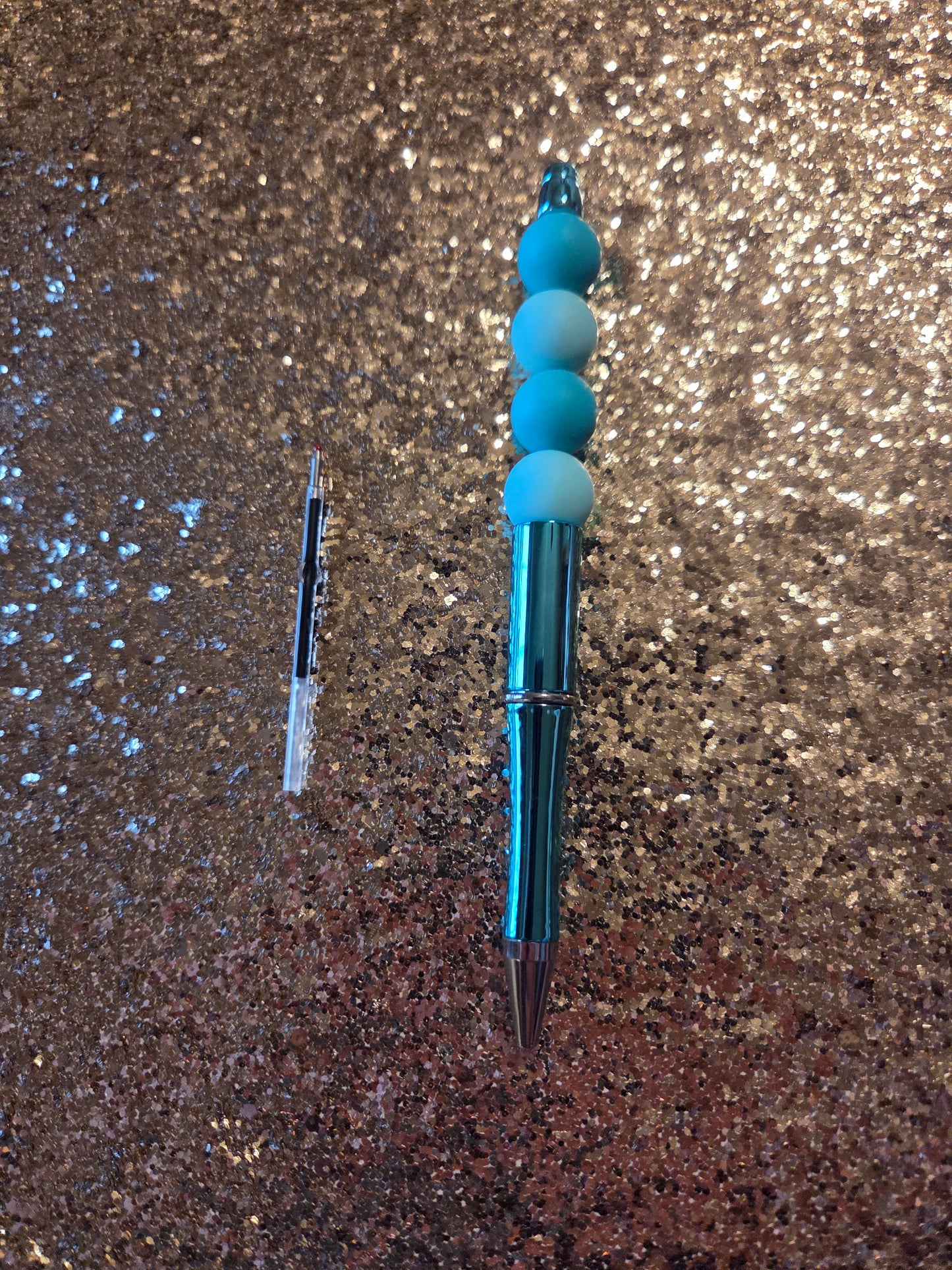 Teal Pen with one Ink Refill